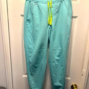 fresh AquaTanson-short joggers and chisec-three pocket top small.